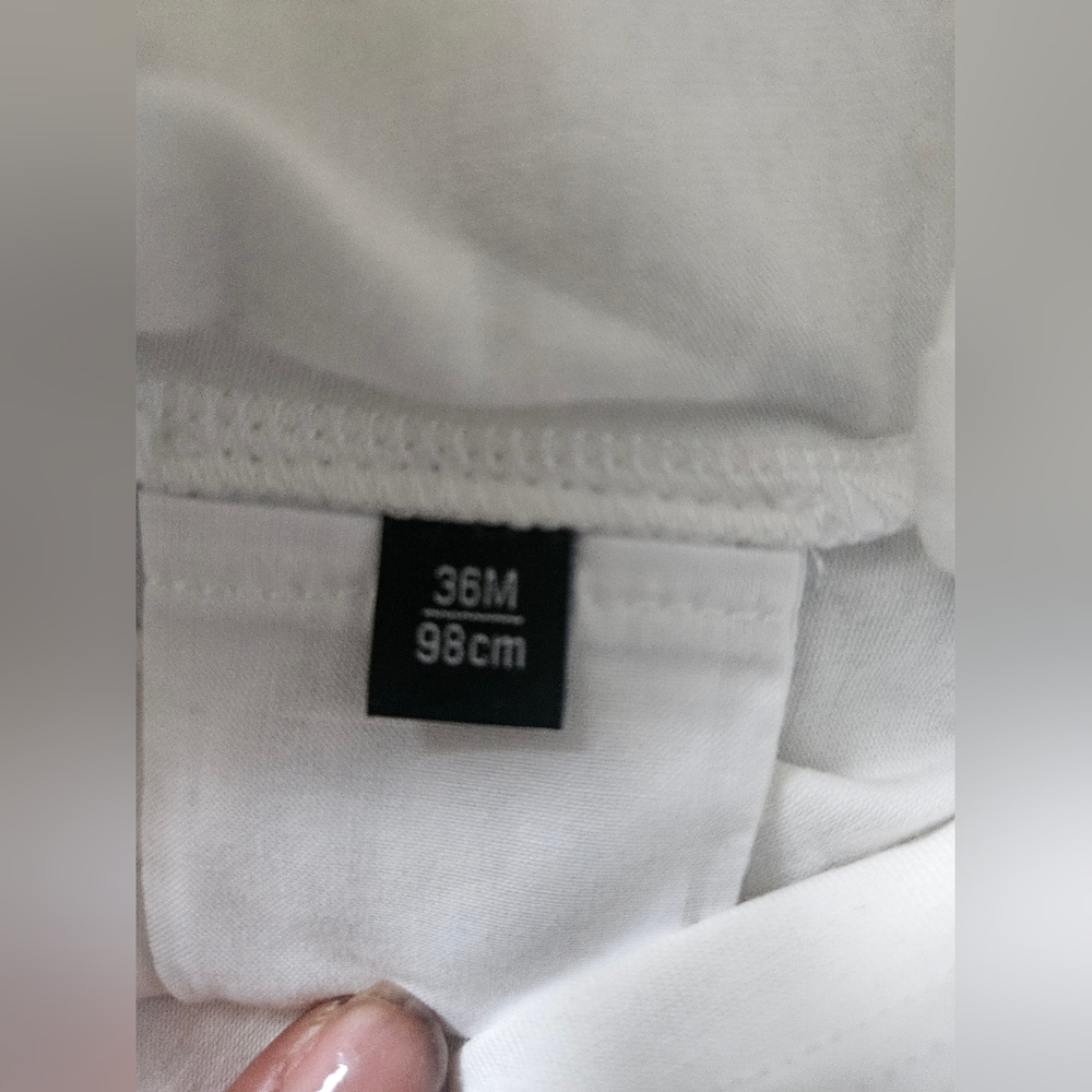 Versace Kids Tee in White with Bold Logo Small Yellowish Stain In Front. - Picture 2 of 13